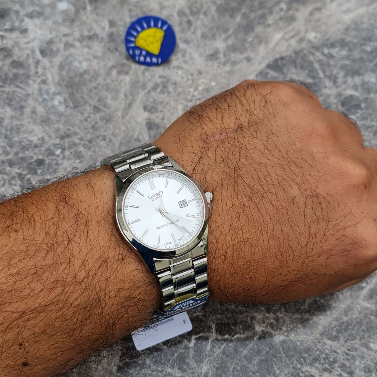 ساعت مردانه کاسیو کد 5605 نقره ای طلایی صفحه سفید