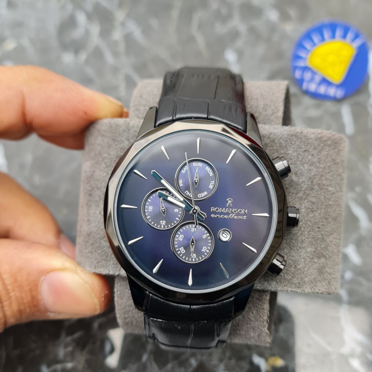 ساعت رومانسون الگانس کد 4710 بند چرم قاب مشکی صفحه سورمه ای