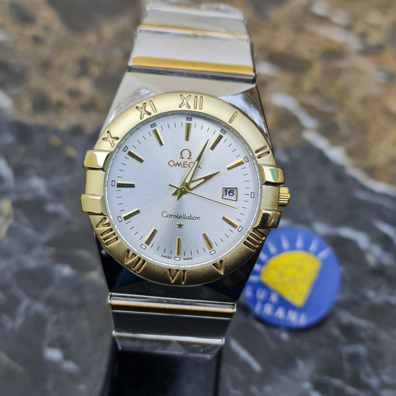 ساعت امگا تمام استیل کد 4910 قاب طلایی نقره ای صفحه سفید